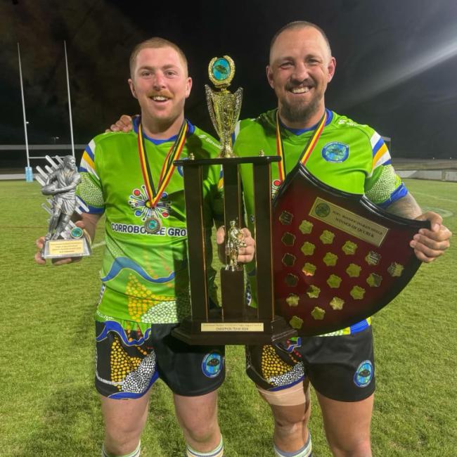 Ryan Dodson with Football Trophy