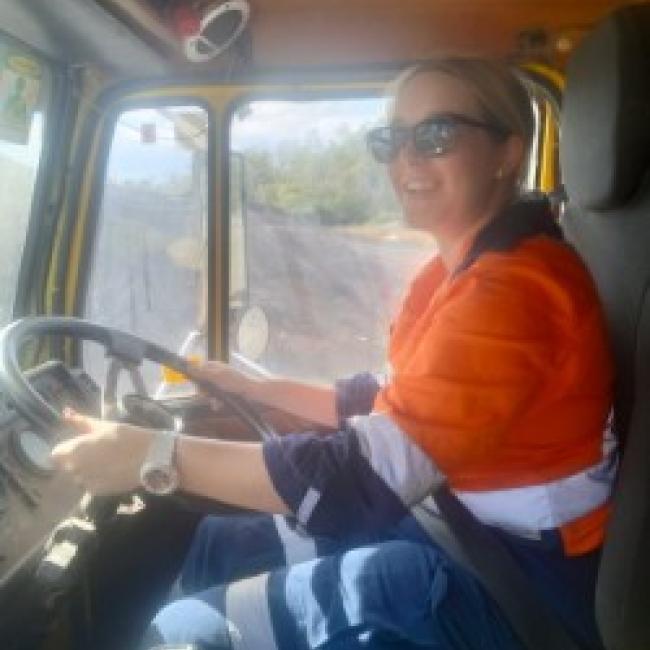 Hanna Moriconi driving a water truck