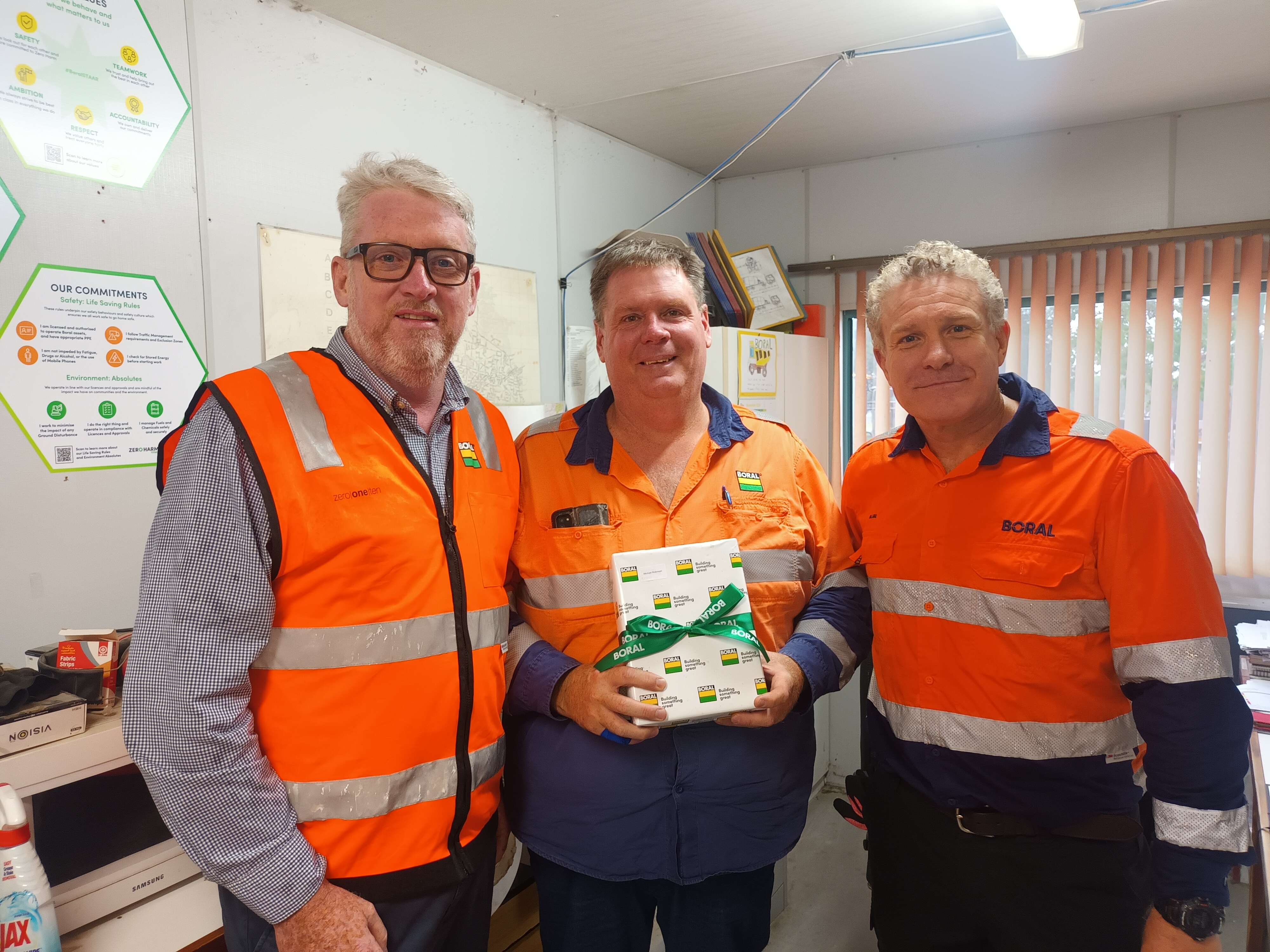 Michael Robinson (centre) with Blake Senior and Paul Noakes.