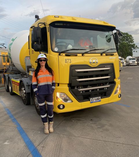 Cindy Villena in hi-vis workgear, in front of a Boral truck