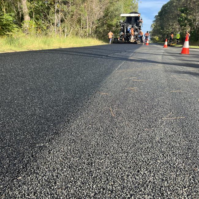 Road paved with asphalt mixed with crumbed rubber