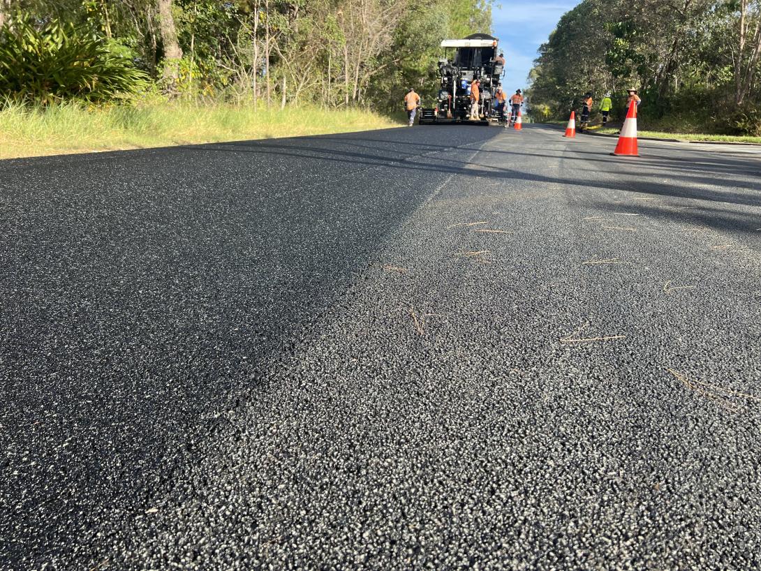 Road paved with asphalt mixed with crumbed rubber