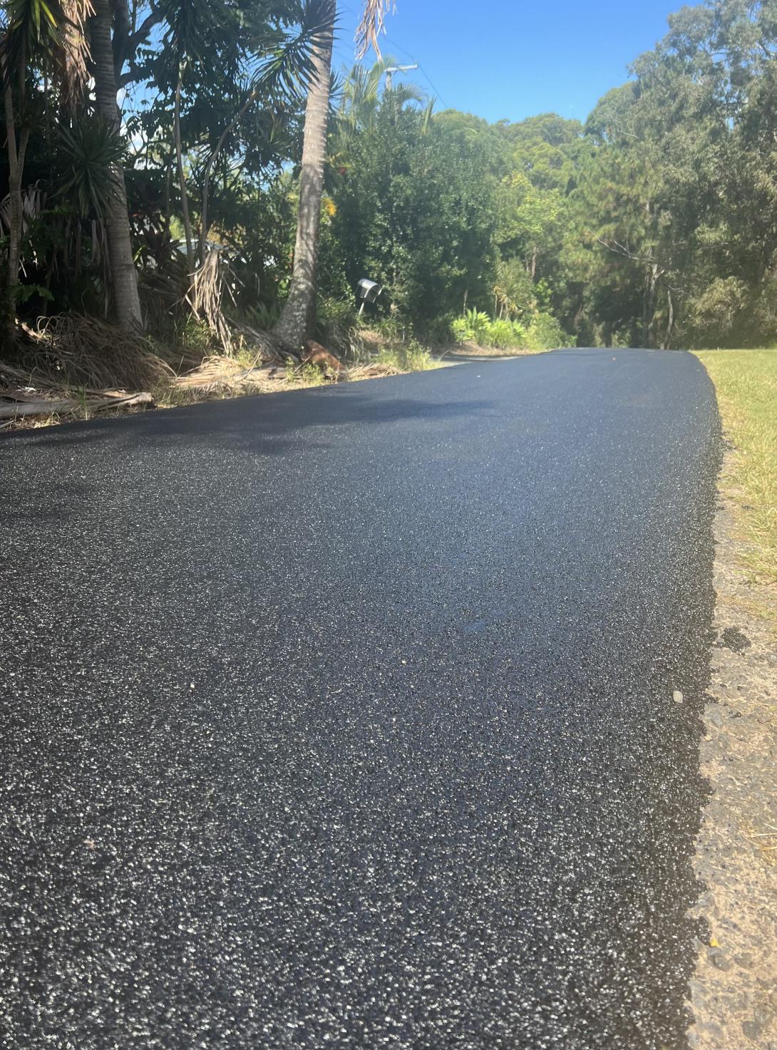 Road paved with asphalt mixed with crumbed rubber