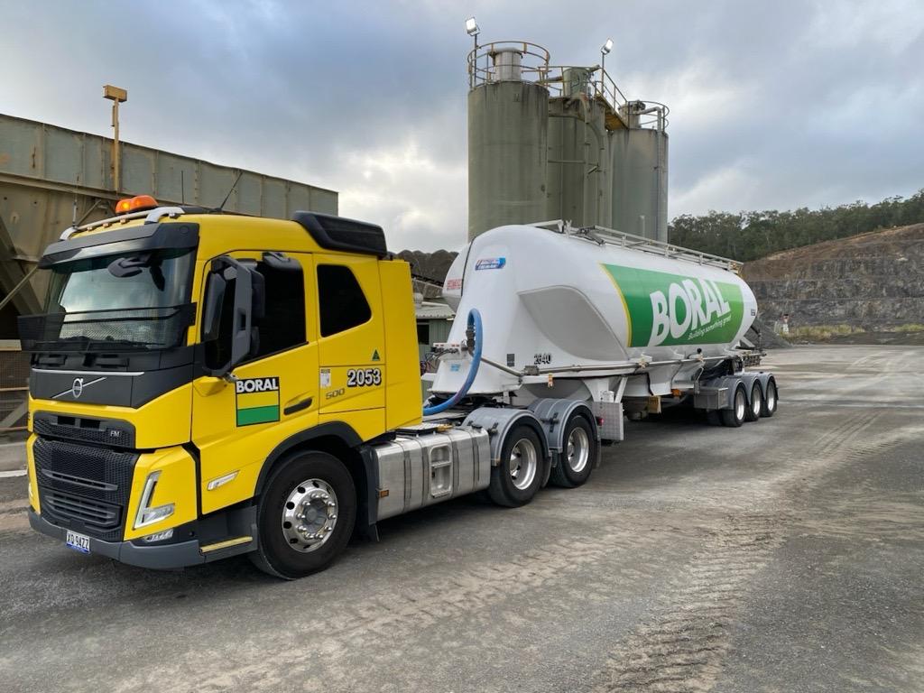 Cement tanker parked in front of batching plant